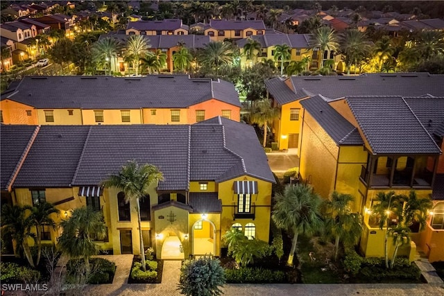9072 Covina Dr N Unit 5505, Naples, FL 34113 - view of front of home featuring a tile roof, stucco siding, and a residential view