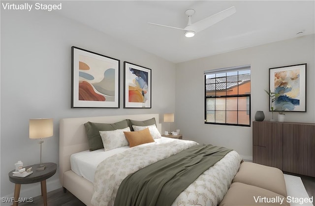 9072 Covina Dr N Unit 5505, Naples, FL 34113 - bedroom with baseboards, wood finished floors, and a ceiling fan