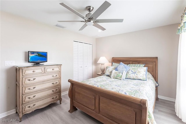 bedroom with visible vents, ceiling fan, light wood-style flooring, and baseboards