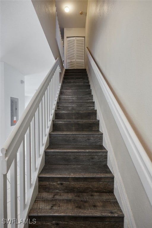 staircase with electric panel