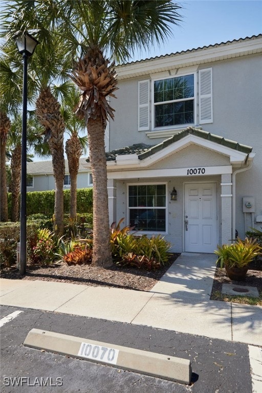 view of front of house featuring stucco siding