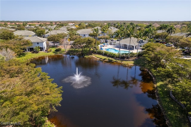 bird's eye view featuring a water view and a residential view