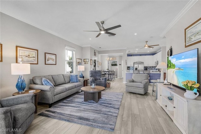 living room with recessed lighting, light wood-style flooring, a ceiling fan, and ornamental molding