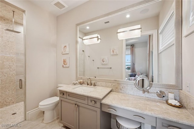 full bath with visible vents, toilet, recessed lighting, a stall shower, and vanity