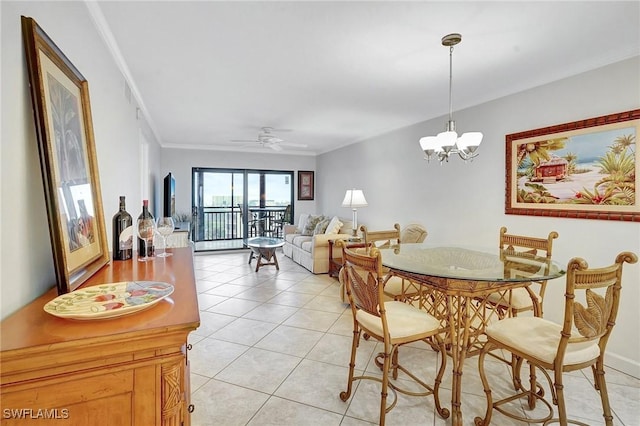 dining space featuring light tile patterned floors, ceiling fan with notable chandelier, and crown molding