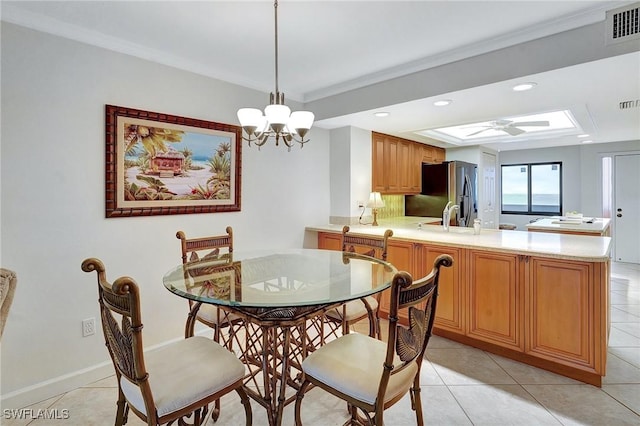 dining room featuring visible vents, baseboards, recessed lighting, ceiling fan with notable chandelier, and light tile patterned flooring