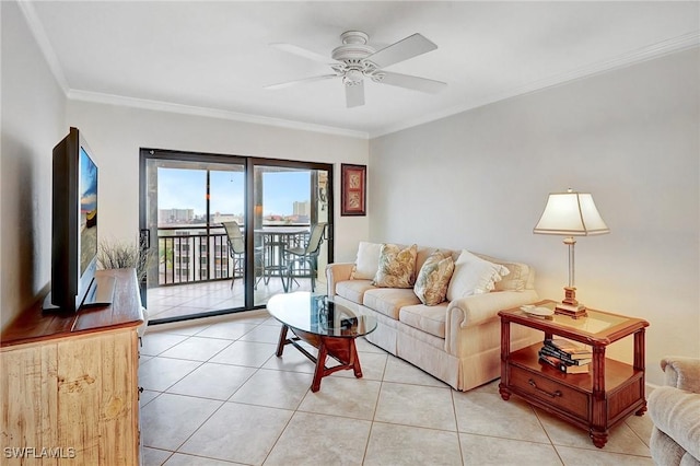 living room with light tile patterned floors, ceiling fan, and crown molding