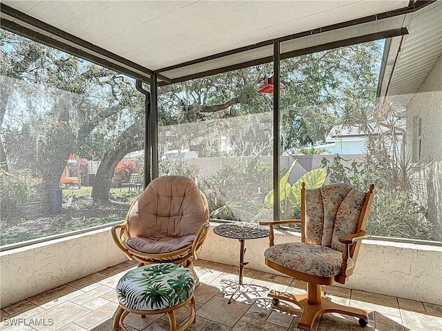 sunroom featuring plenty of natural light