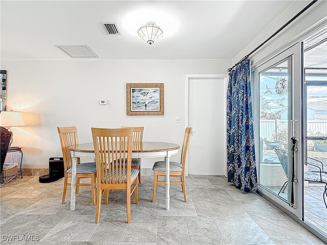 dining room with visible vents