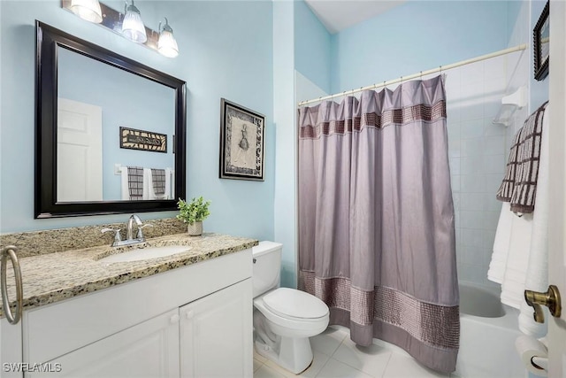 bathroom with tile patterned flooring, toilet, vanity, and shower / tub combo