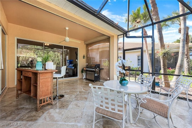 sunroom with beamed ceiling and plenty of natural light