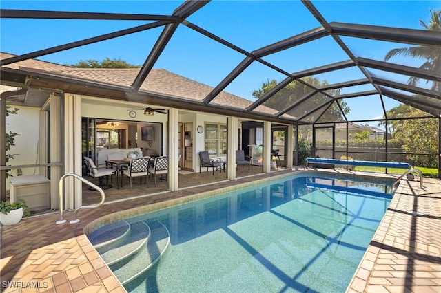 view of swimming pool with a patio area and a covered pool