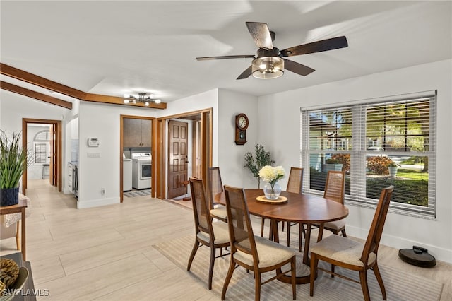 dining space featuring baseboards, separate washer and dryer, ceiling fan, and light wood finished floors