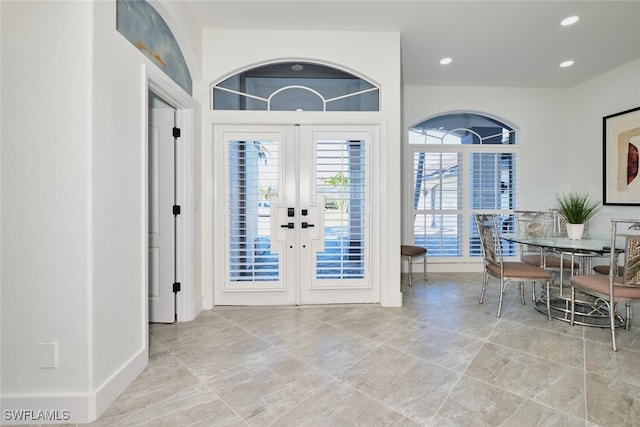 entrance foyer featuring recessed lighting and french doors