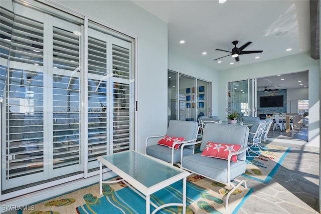 view of patio / terrace featuring outdoor dining area and a ceiling fan