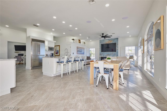 dining space with visible vents, recessed lighting, and a ceiling fan