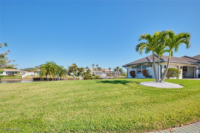 view of yard featuring a water view