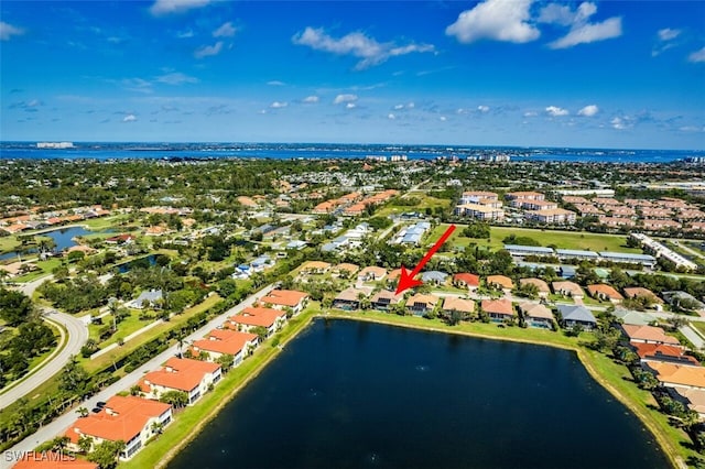 aerial view with a water view and a residential view