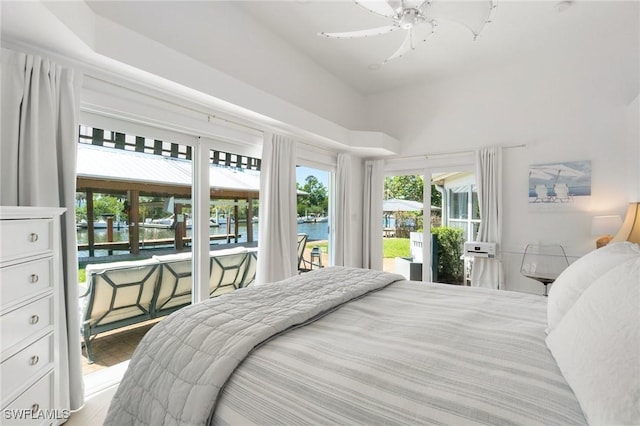 bedroom featuring wood finished floors and access to outside