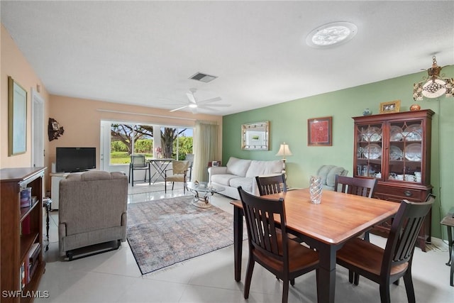 dining space featuring ceiling fan and visible vents