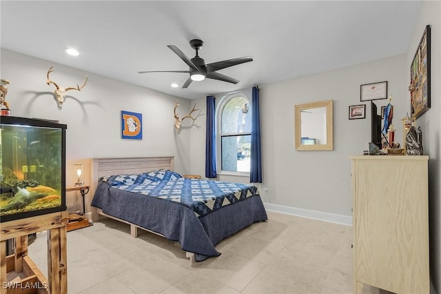 bedroom with a ceiling fan, recessed lighting, and baseboards