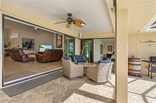 view of patio with ceiling fan