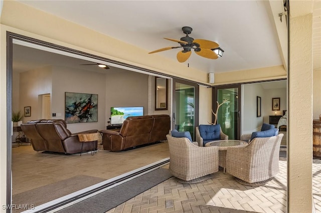 view of patio with ceiling fan