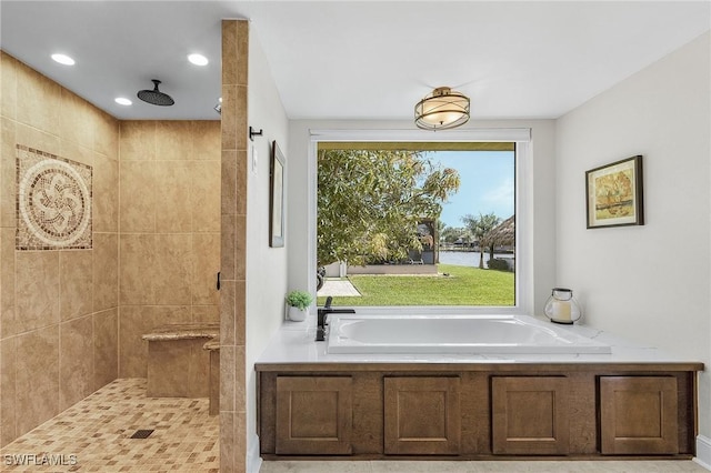 full bathroom with recessed lighting, a stall shower, and a bath