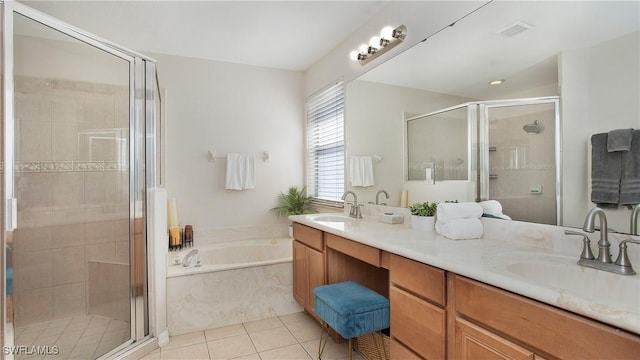 full bath with tile patterned flooring, a shower stall, a garden tub, visible vents, and double vanity