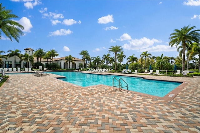 community pool featuring a patio