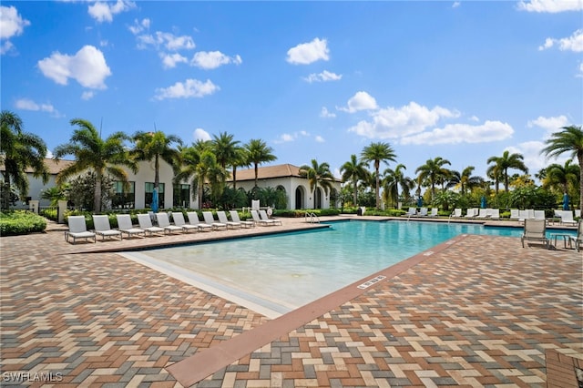 community pool with a patio