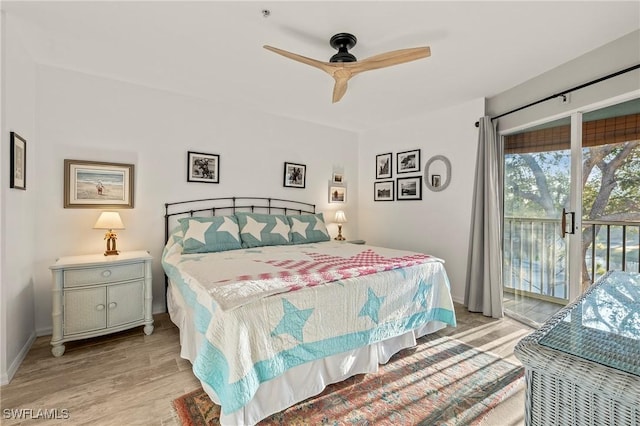 bedroom featuring access to outside, baseboards, light wood finished floors, and ceiling fan