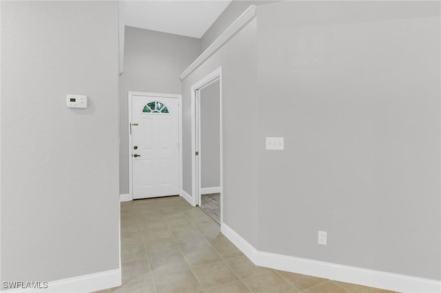 entrance foyer featuring baseboards