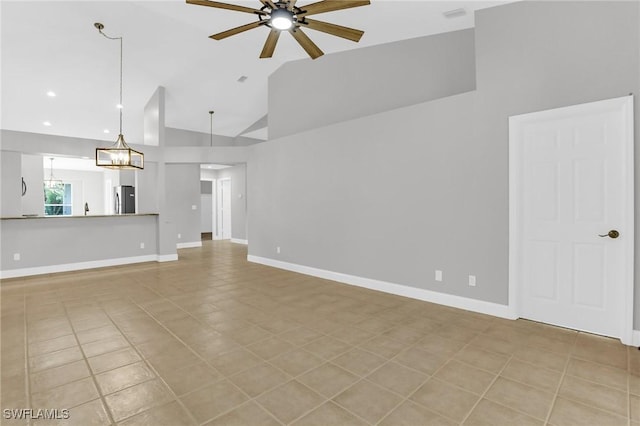 unfurnished living room with high vaulted ceiling, a ceiling fan, recessed lighting, light tile patterned flooring, and baseboards