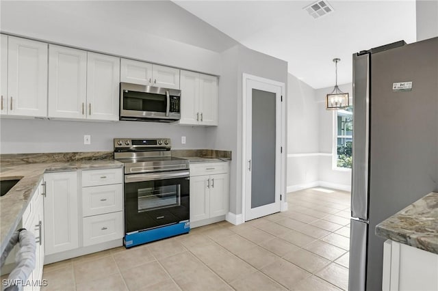 kitchen with light tile patterned floors, visible vents, an inviting chandelier, white cabinets, and appliances with stainless steel finishes