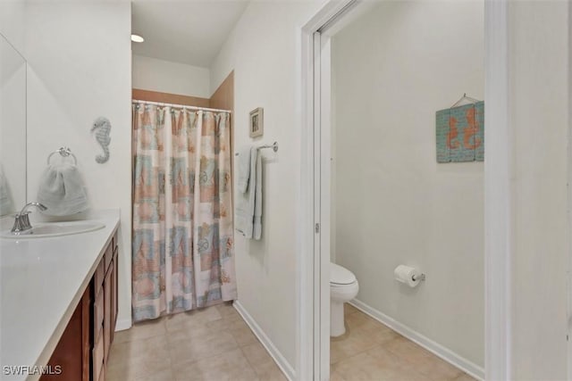 full bathroom with toilet, a shower with shower curtain, tile patterned flooring, baseboards, and vanity