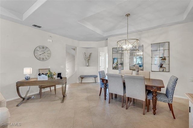 dining room with visible vents, a tray ceiling, an inviting chandelier, light tile patterned flooring, and baseboards