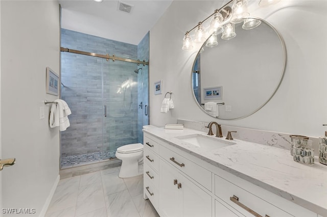 full bathroom featuring visible vents, toilet, a stall shower, baseboards, and vanity