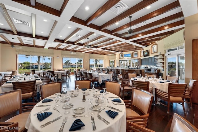 dining space featuring beamed ceiling, visible vents, coffered ceiling, and ceiling fan