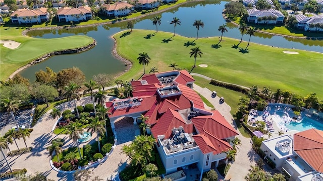 bird's eye view with golf course view and a water view