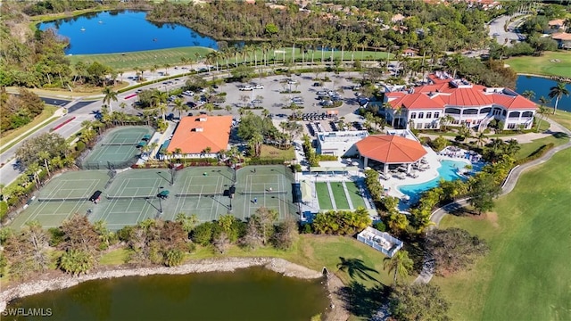 birds eye view of property with a water view