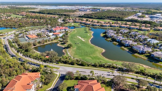 aerial view featuring a water view and golf course view