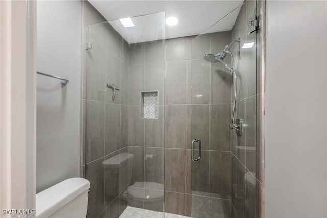 886 Tanbark Dr SW Unit 103, Naples, FL 34108 - bathroom featuring toilet and a stall shower