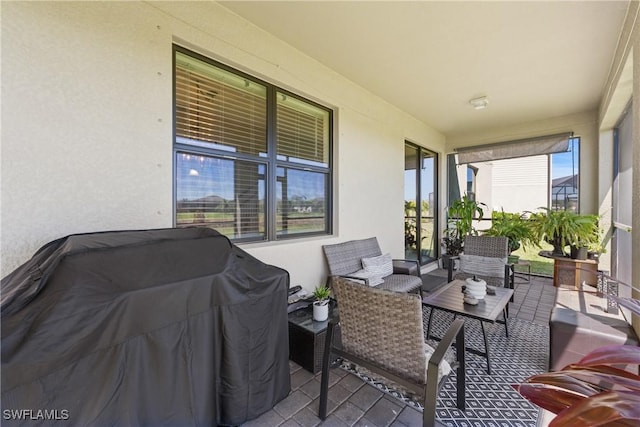 view of patio / terrace featuring area for grilling and an outdoor hangout area