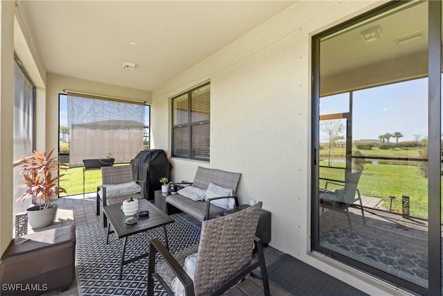 sunroom featuring visible vents