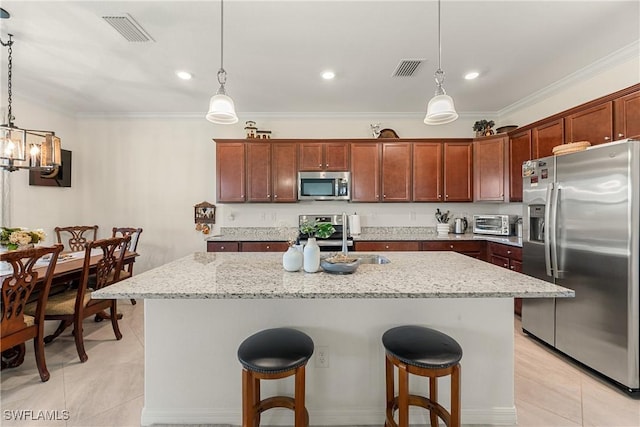 kitchen featuring ornamental molding, appliances with stainless steel finishes, and visible vents