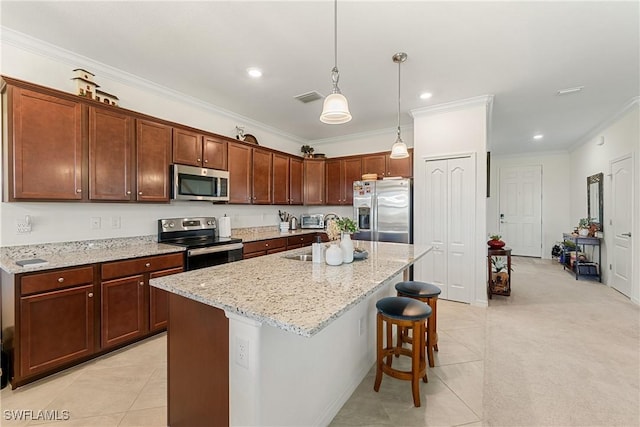 kitchen with light tile patterned floors, a sink, visible vents, appliances with stainless steel finishes, and crown molding