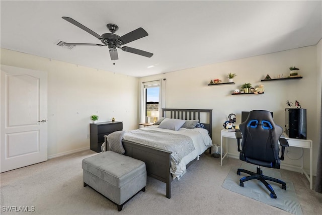 bedroom with light carpet, visible vents, a ceiling fan, and baseboards