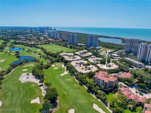 bird's eye view with a view of city, golf course view, and a water view