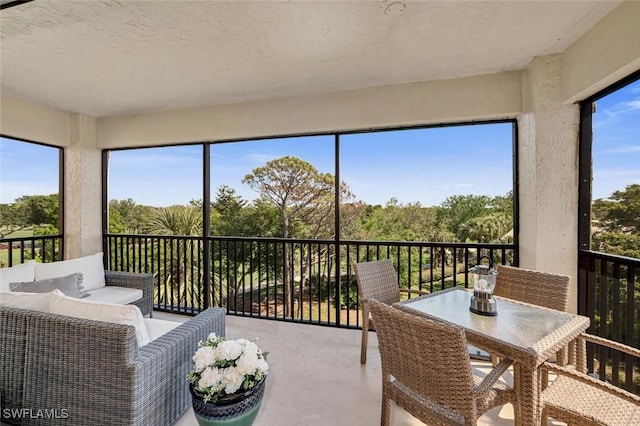 sunroom featuring plenty of natural light